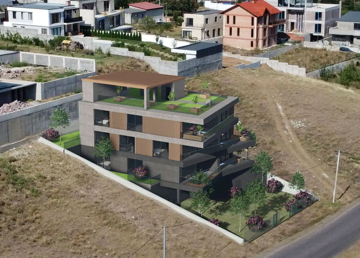 Tbilisi Real Estate – modern architecture design Tabor Hill investment land plot with panoramic views: Render of modern apartment building with rooftop terrace, wood paneling, and landscaped entry – Tabor Hill project by LD Estates in Tbilisi