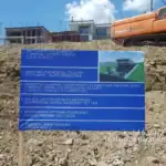 real estate investment opportunity: On-site construction permit signboard for LD Estates apartment project in Tabor Hill, Tbilisi – showing permit number, date, and render