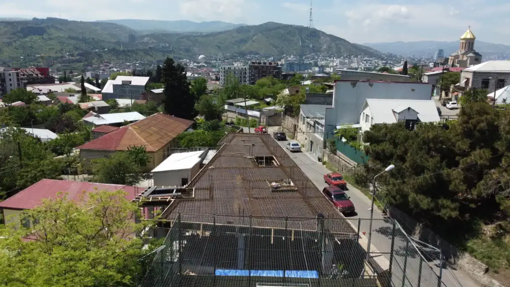 Real estate investment projects in Tbilisi: Concrete slab reinforcement work on Avlabari investment building in Tbilisi, June 2025