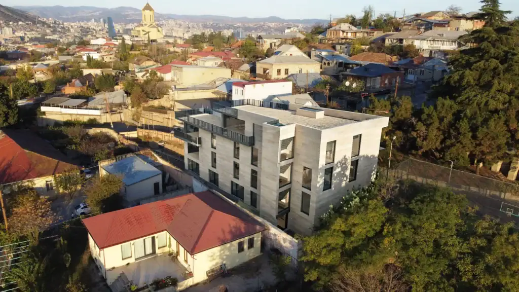 Travertine facade — AI-generated customizable facades in Tbilisi. Avlabari Hill investment building.