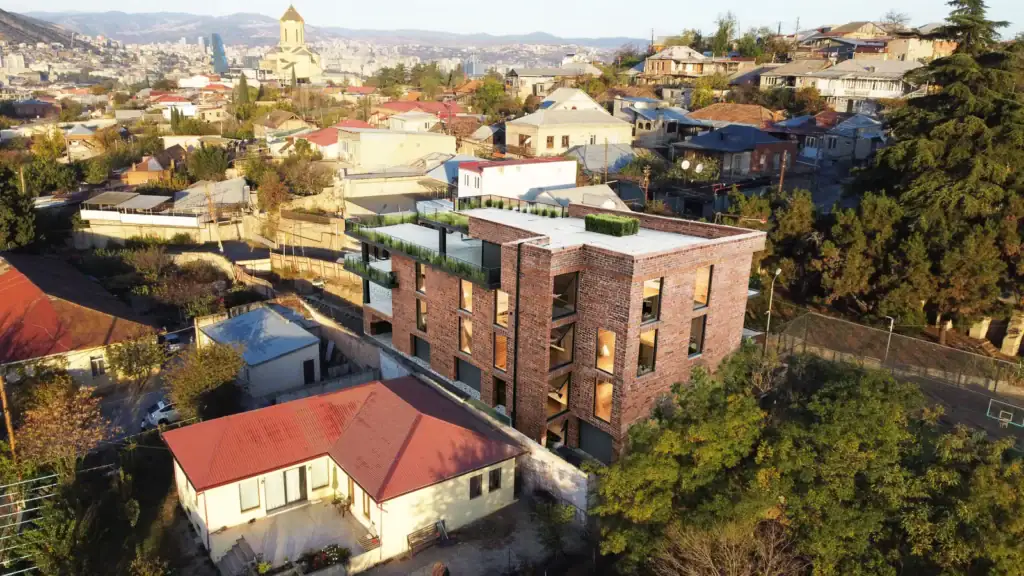 -avlabari-investment-building-red-brick-facade-tbilisi-