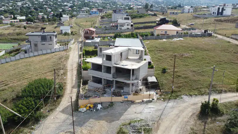 Tabor Hill Villa — three-storey villa at black-frame stage, Tbilisi
